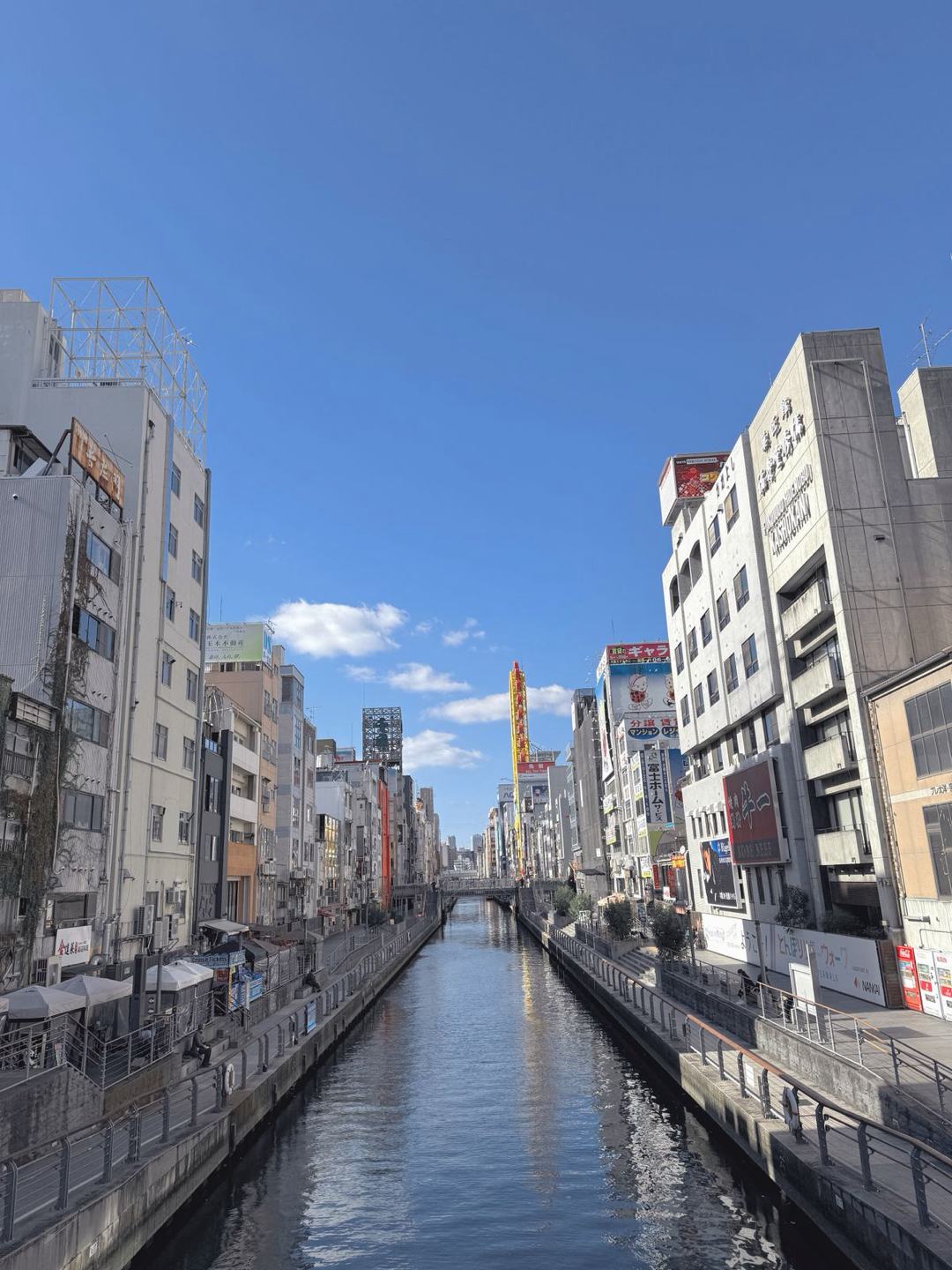 Dotonbori by day. Shop signs in this photograph are not halal verification.