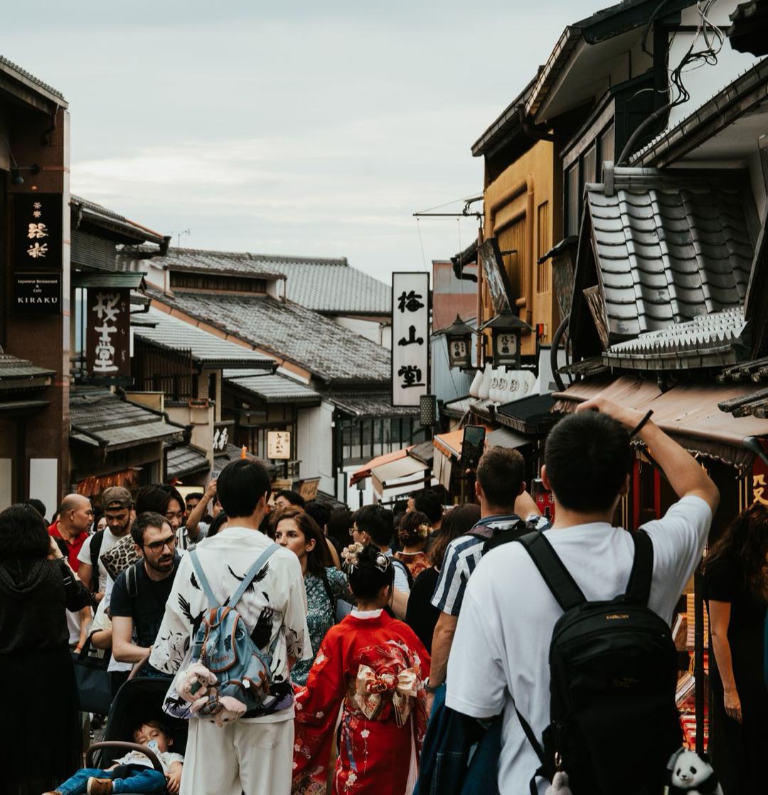 Visitors along a historic Kyoto street. Shops pictured are not halal food recommendations.