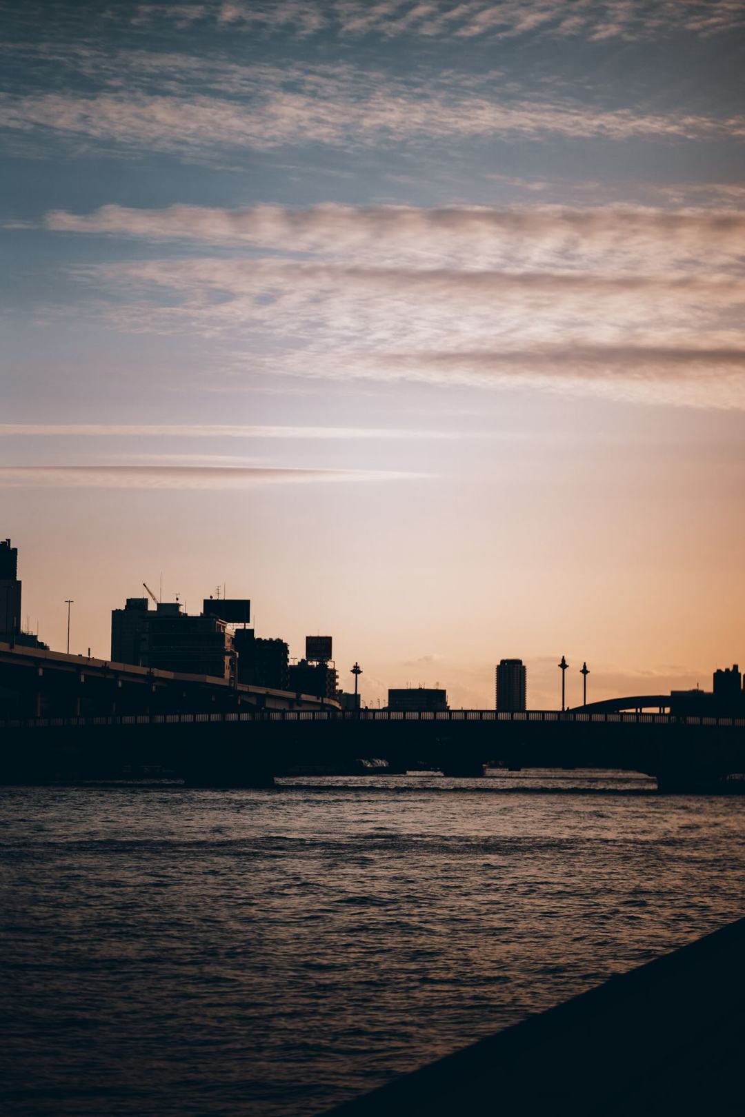 Tokyo’s Sumida River at dusk; a riverside view, not an exact route pin.